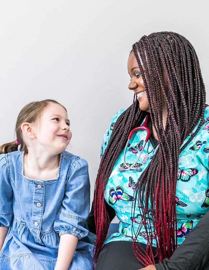 Nurse Smiling With Student